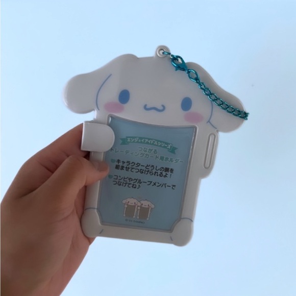 𝚂𝙰𝙽𝚁𝙸𝙾 𝙸𝙳 - 𝙿𝙸𝙲𝚃𝚄𝚁𝙴 𝙷𝙾𝙻𝙳𝙴𝚁 - Picture 3 of 4